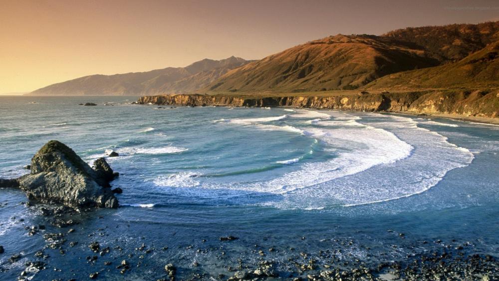 Serene Coastal Landscape at Sunset wallpaper