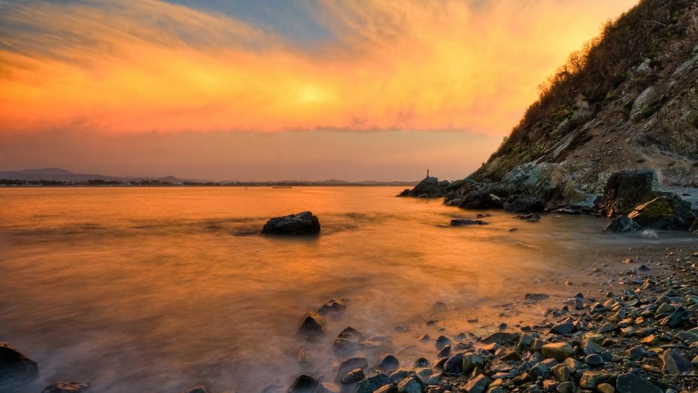 Serene Sunset Over Tranquil Waters wallpaper
