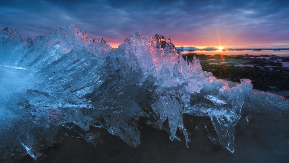 Icy Dawn Over Crystal Peaks wallpaper