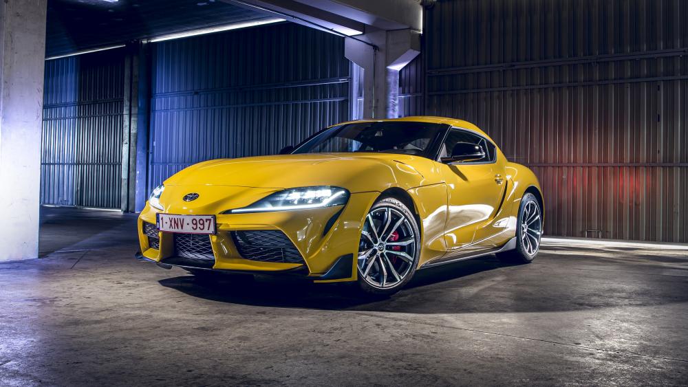 Yellow 2020 Toyota Supra Sports Car in Industrial Ambiance wallpaper