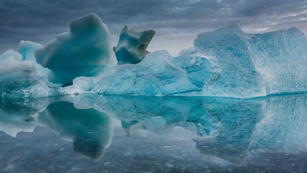 Glacial Reflections in Tranquil Waters wallpaper