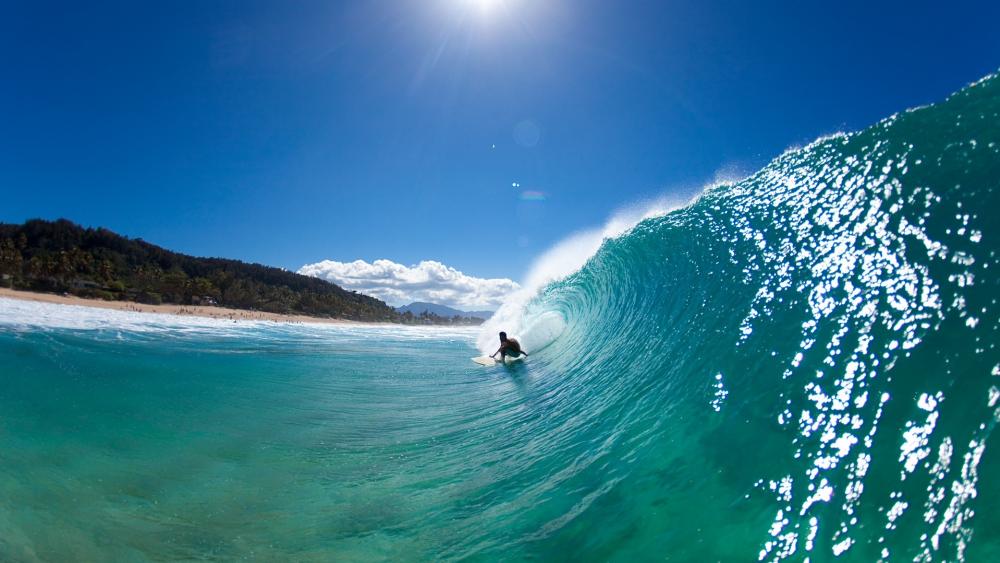Epic Surfing in Crystal Clear Waves wallpaper