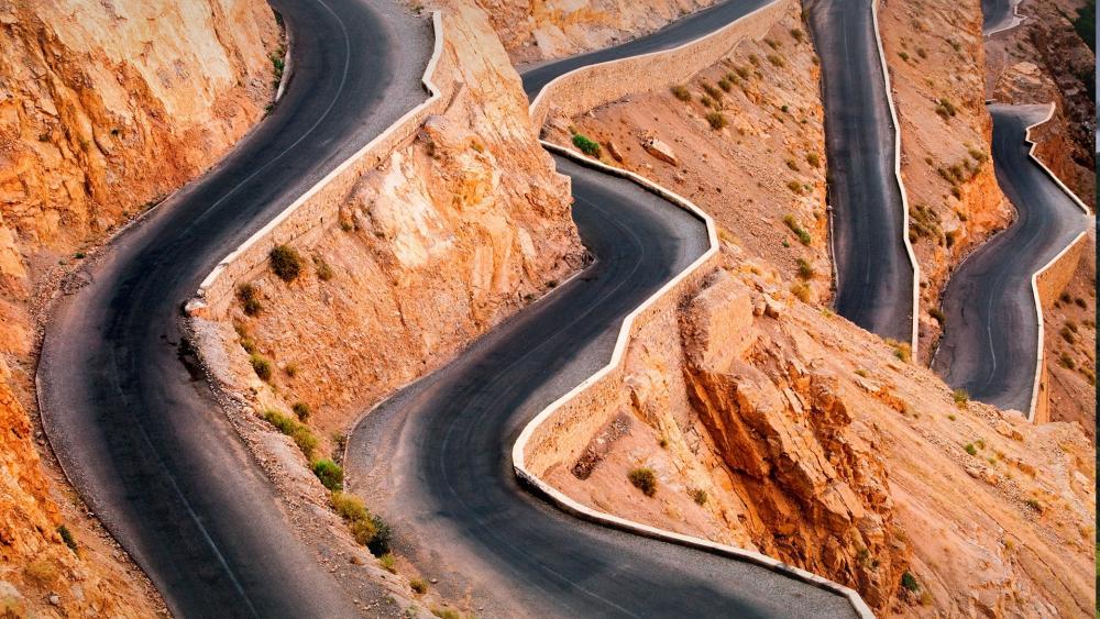 Winding Roads Through Desert Landscapes wallpaper