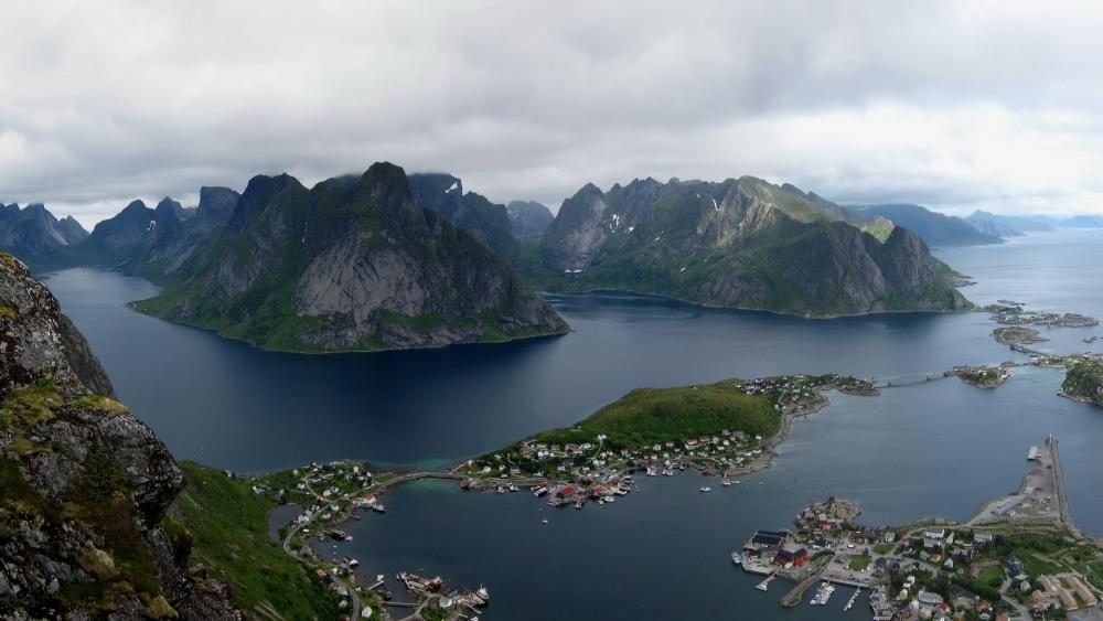 Serene Norwegian Fjords Captured in Majestic Landscape wallpaper