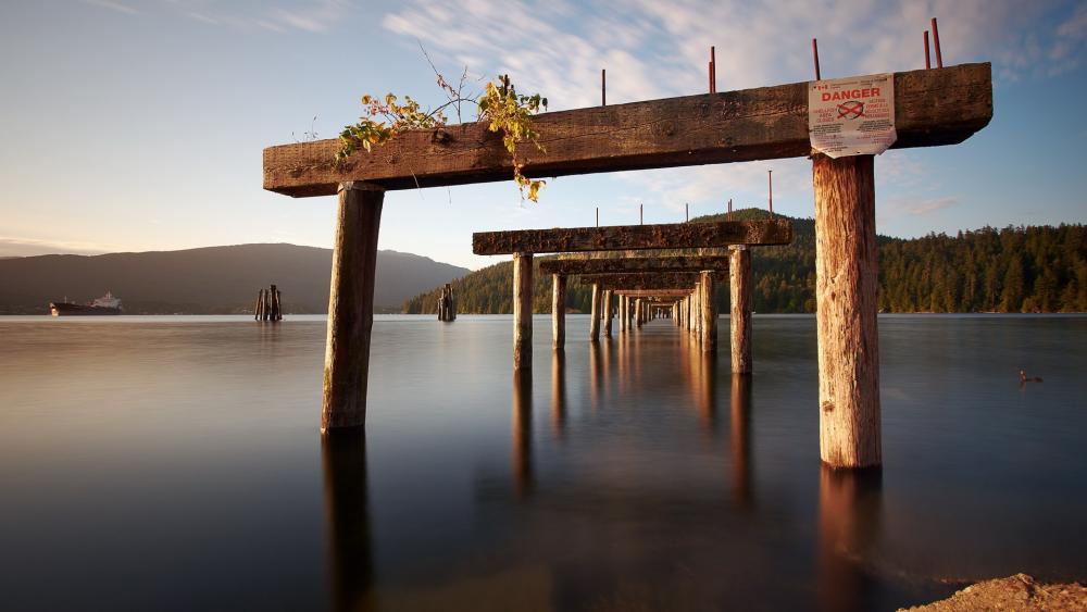 Serene Reflections of an Abandoned Pier wallpaper