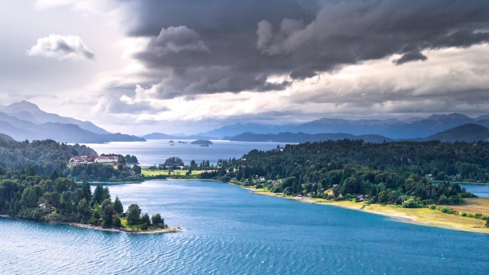 Majestic Landscape of Tranquil Waters and Mountains wallpaper