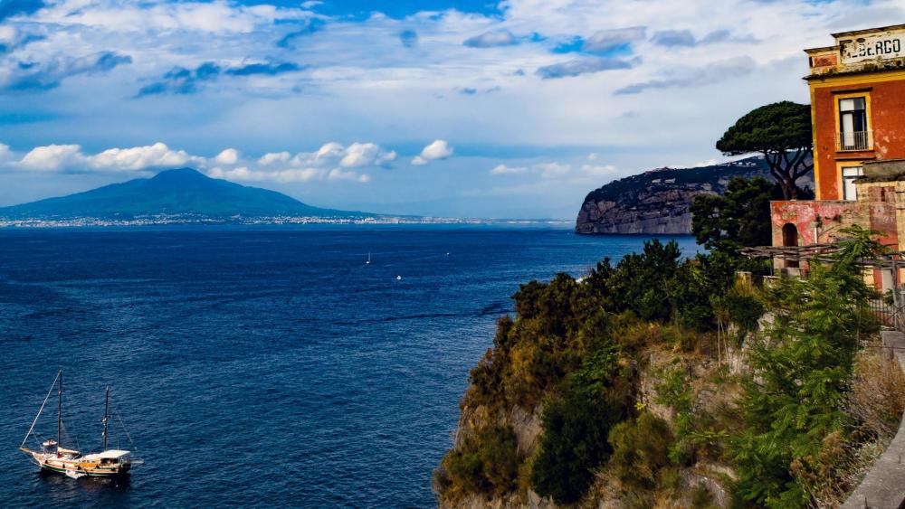 Breathtaking Coastal View with Mount Vesuvius wallpaper