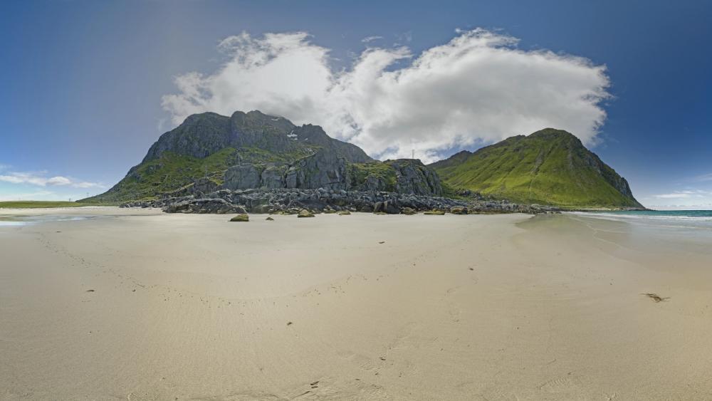 Majestic Coastal Landscape Under Blue Sky wallpaper
