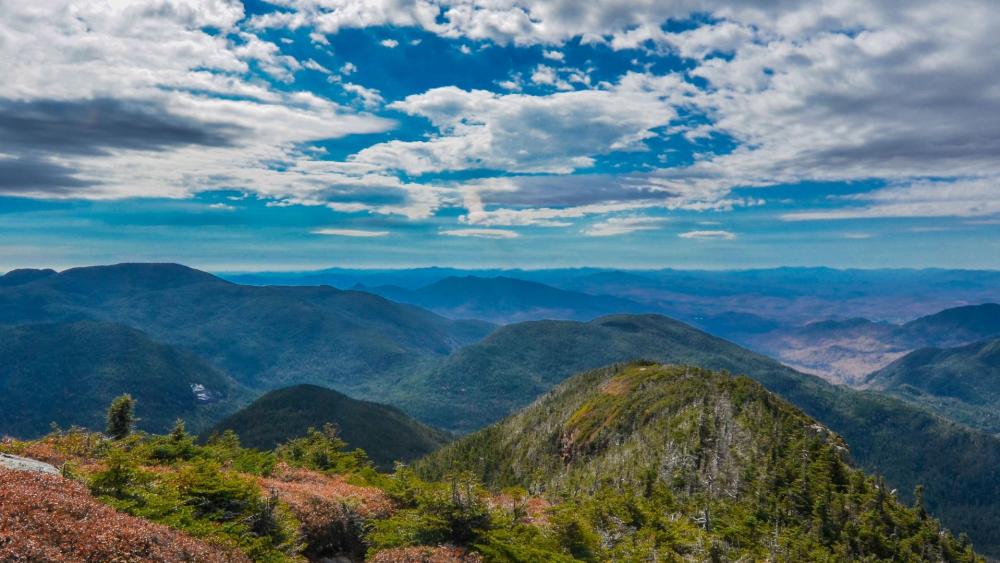 Breathtaking Mountain Landscape Under a Vast Sky wallpaper