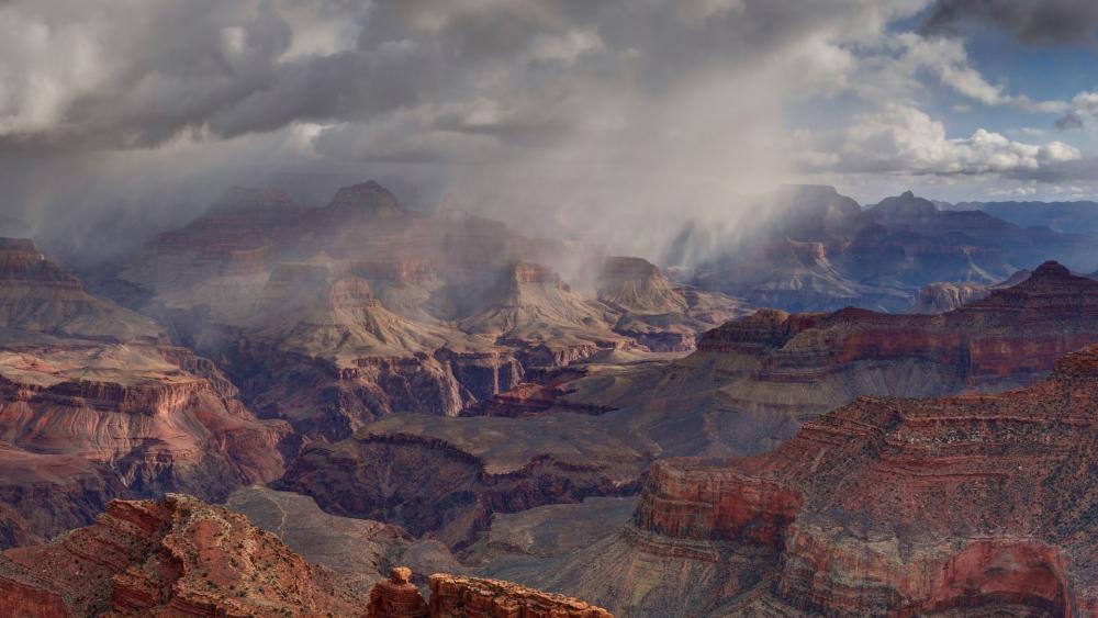 Majestic Grand Canyon Under Dramatic Skies wallpaper