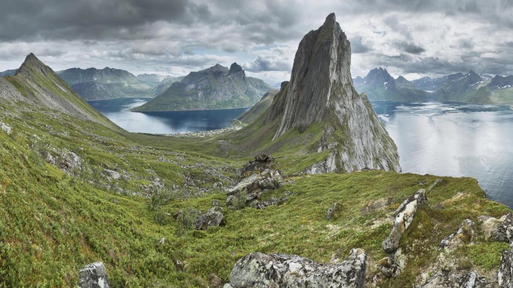 Majestic Mountain View Above Serene Waters wallpaper