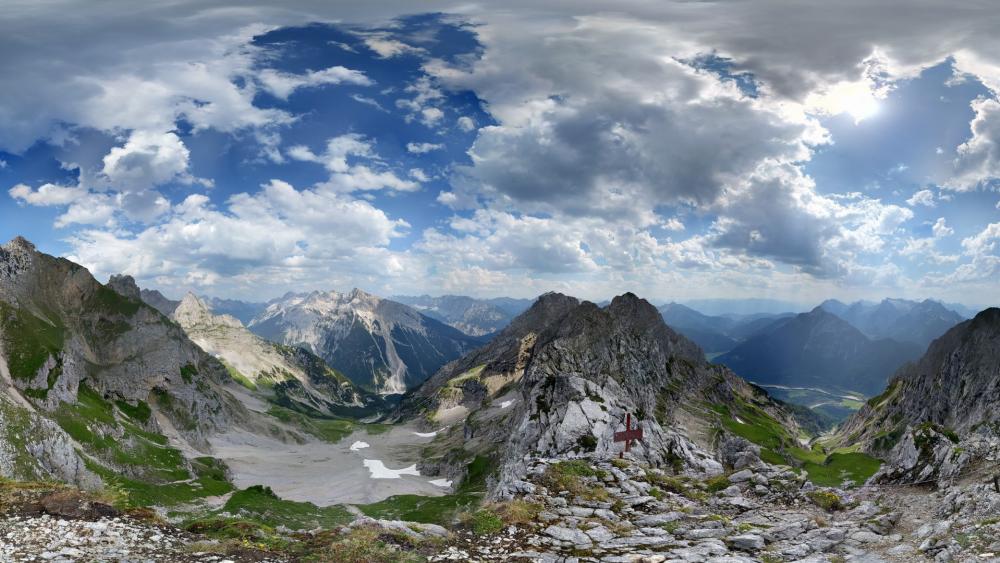Majestic Mountain Panorama Capturing Nature's Grandeur wallpaper