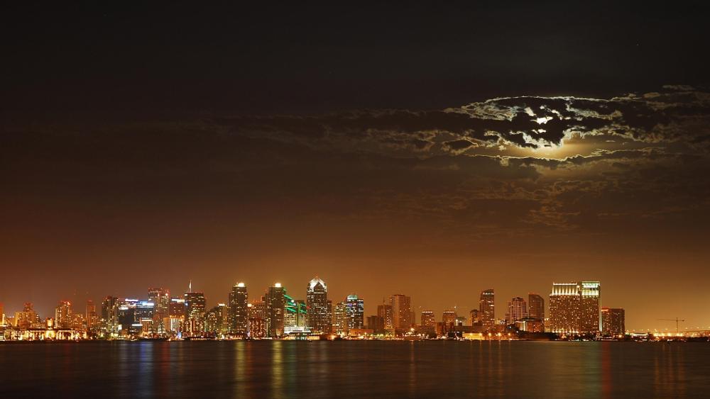 Moonlit Cityscape by Night Sky wallpaper