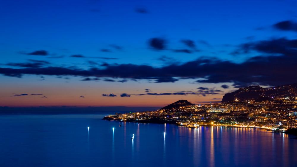 Serene Coastal Cityscape at Dusk wallpaper