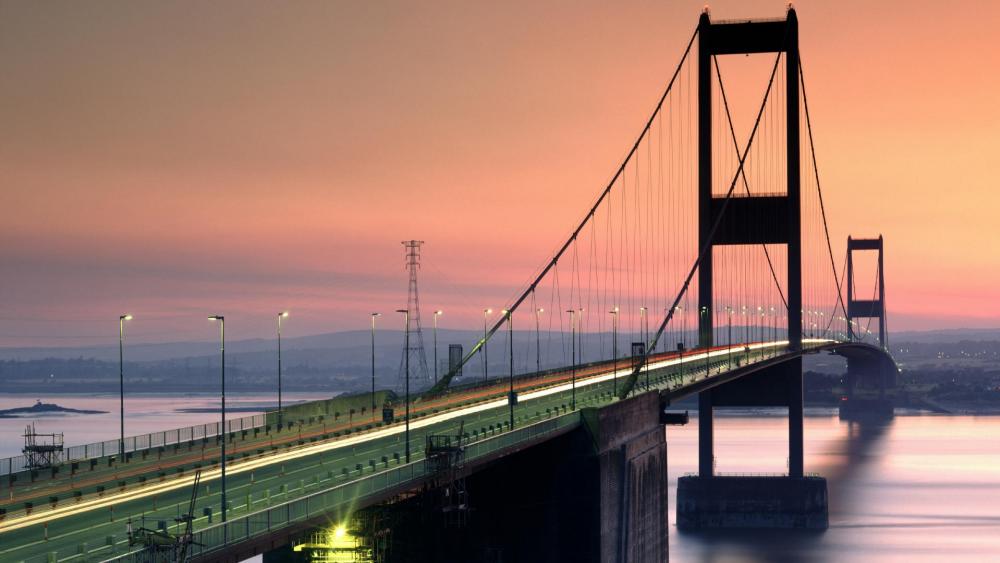 Majestic Sunset Over the City Bridge wallpaper