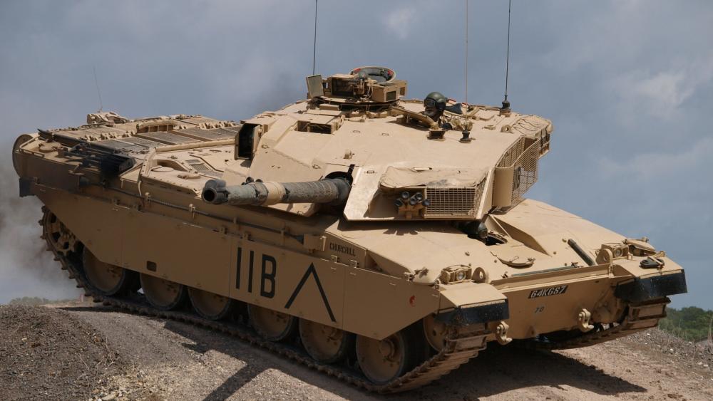 Powerful Tank in Natural Landscape wallpaper