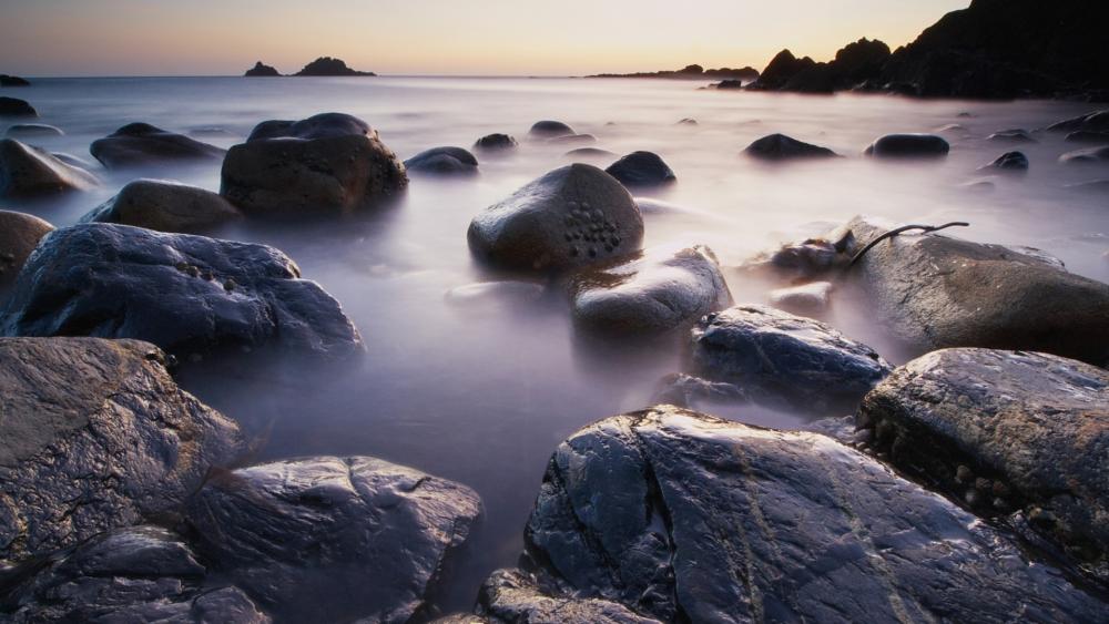 Serenity of Smooth Ocean Stones wallpaper