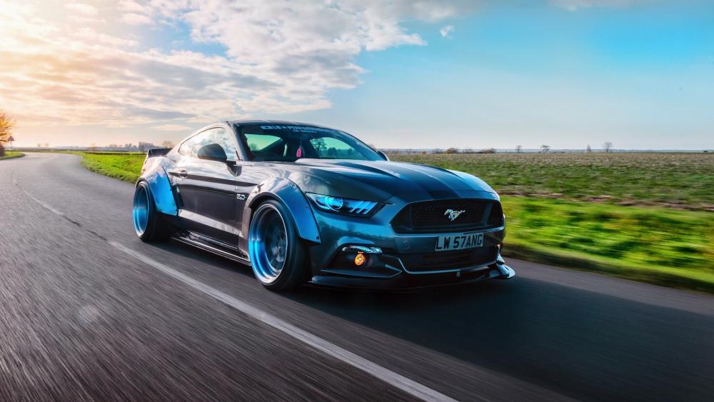 Dynamic Mustang on Open Road wallpaper