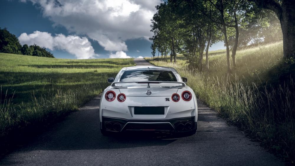 Sleek Nissan GT-R on a Serene Country Road wallpaper