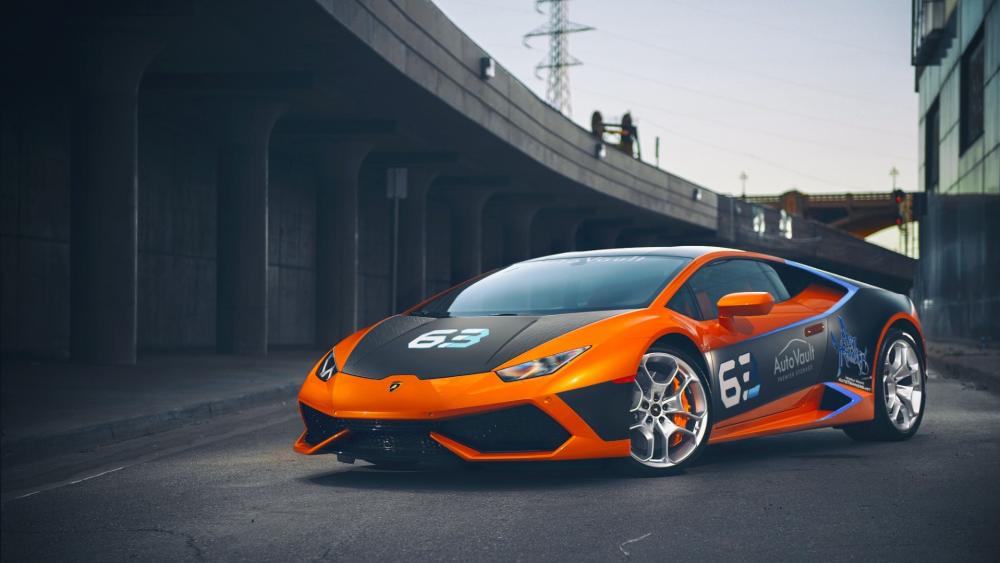 Dynamic Lamborghini Huracán in Vibrant Orange and Black Design wallpaper