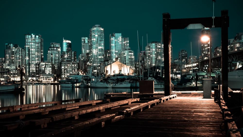 Urban Nightlife Reflected in Waterscape wallpaper