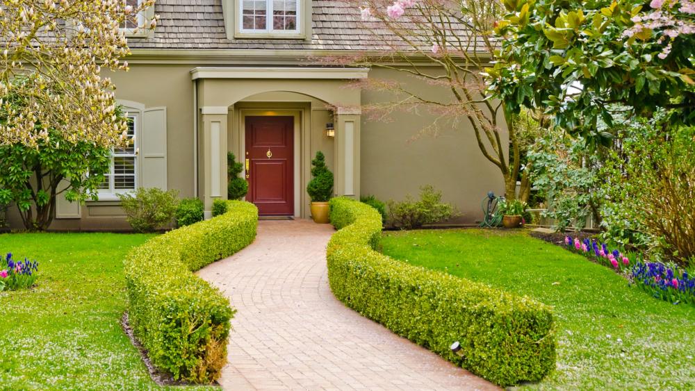 Charming Garden Pathway to Home Entrance wallpaper