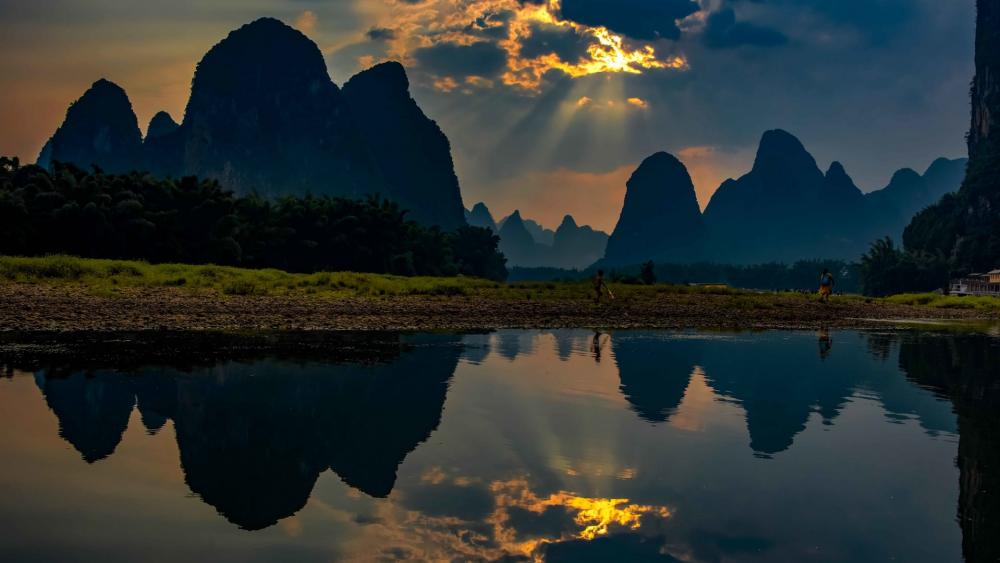 Serene Mountain Reflections in Nature's Embrace wallpaper
