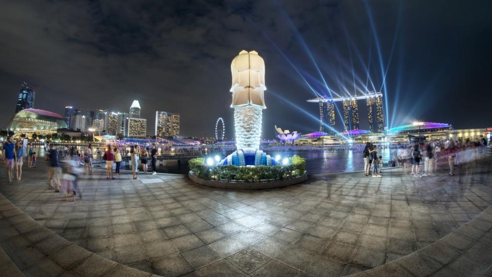 Stunning Nightscape of a City by the Water wallpaper