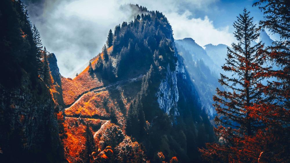 Majestic Mountain Peaks in Autumn Splendor wallpaper