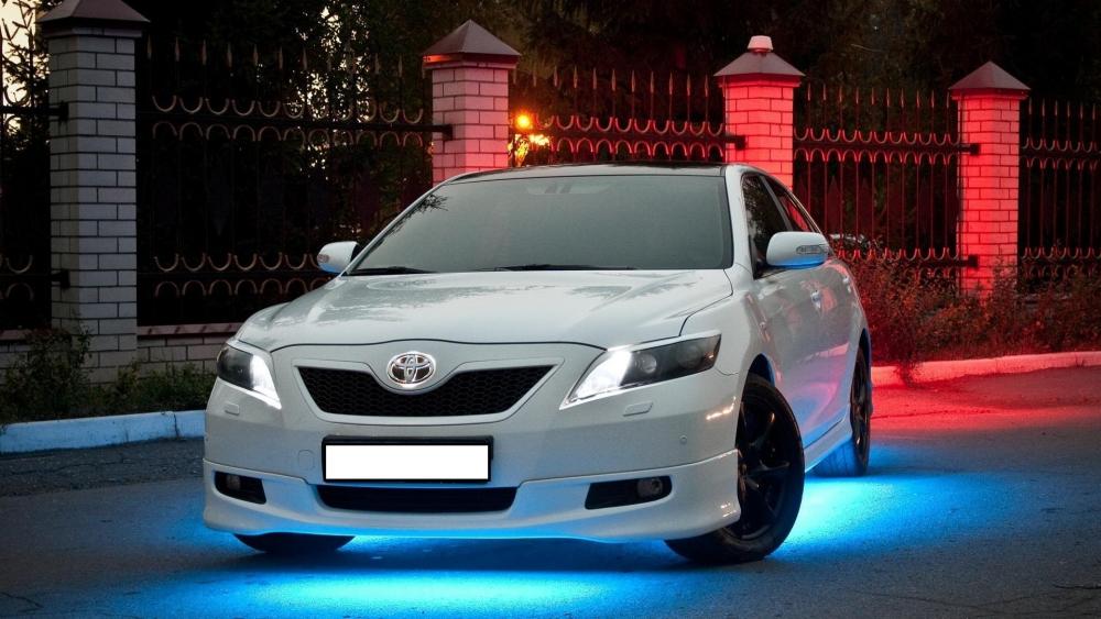Sleek White Car with Stunning LED Lights wallpaper