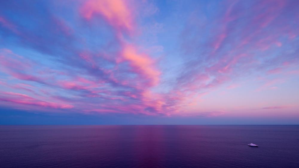 Pink sky and purple sea wallpaper