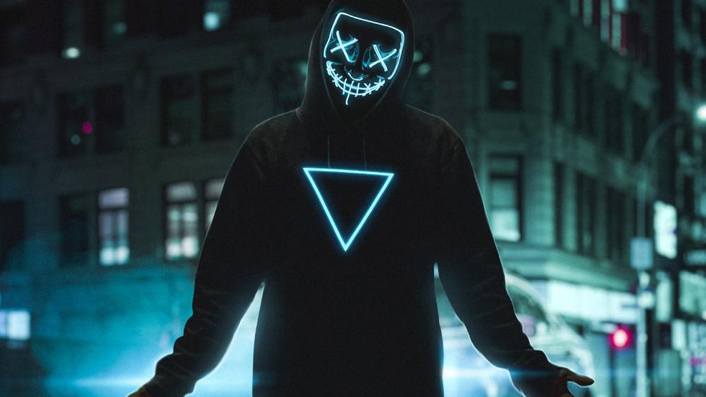 Mysterious Neon Masked Figure wallpaper