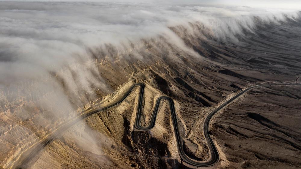 Aerial Photo of Clouds Gliding in the Negev Desert wallpaper