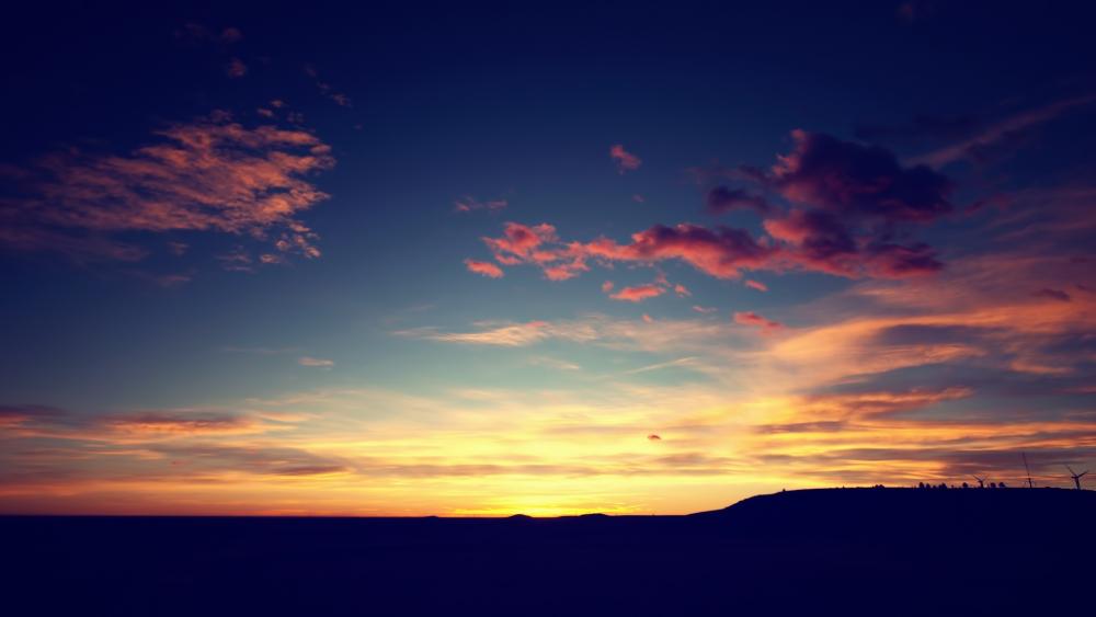 Majestic Sunset Over Tranquil Horizon wallpaper