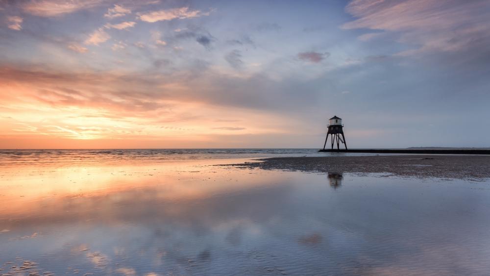 Serene Sunset Over Calm Waters wallpaper