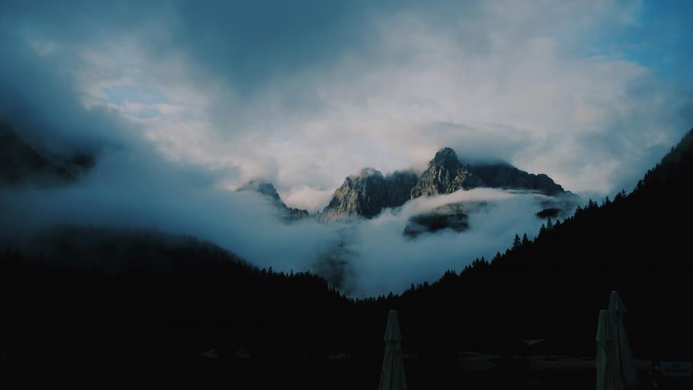 Mystical Cloud-Wrapped Alps wallpaper