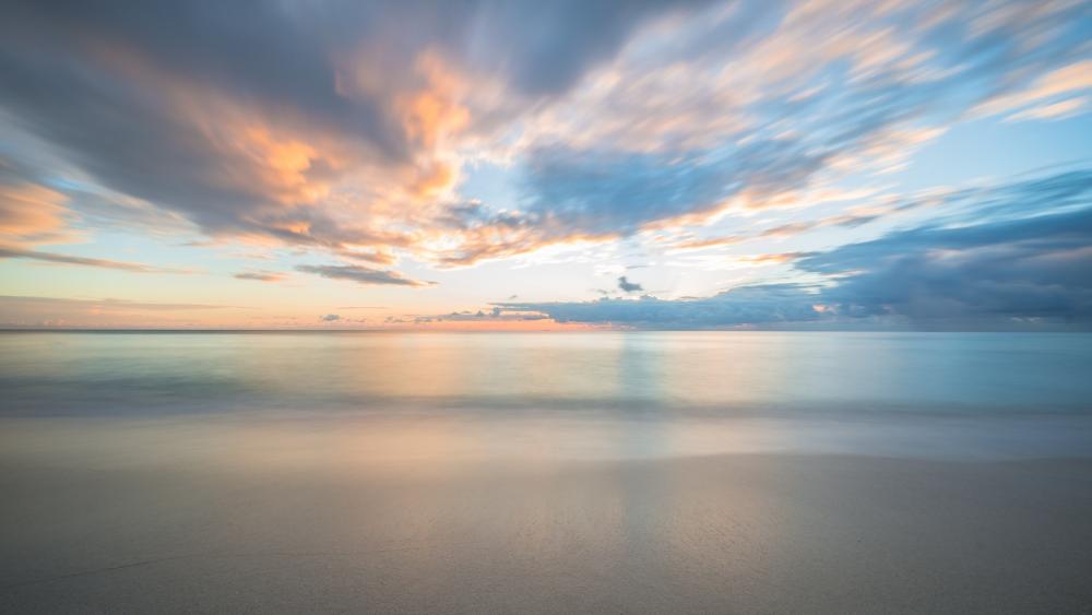 Serene Coastal Sunset Scene wallpaper