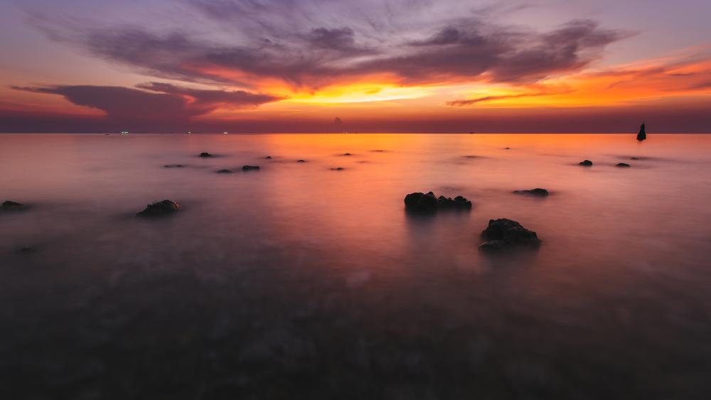 Serene Sunset Over Tranquil Waters wallpaper