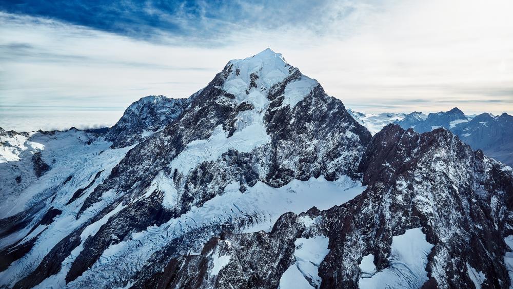 Majestic Snow-Capped Mountain Peaks wallpaper