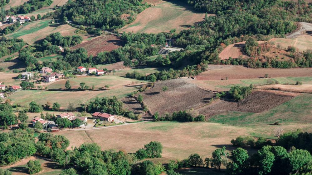 Serene Aerial View of Rolling Hills and Lush Countryside wallpaper