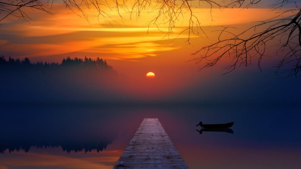 Sunset Serenity Over Misty Lake wallpaper