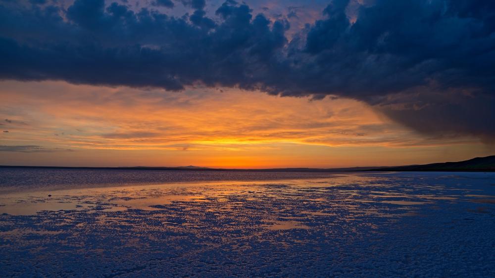 Sunset Serenity on a Tranquil Beach wallpaper