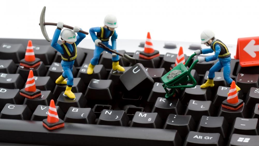 Tiny Technicians at Work on Keyboard wallpaper