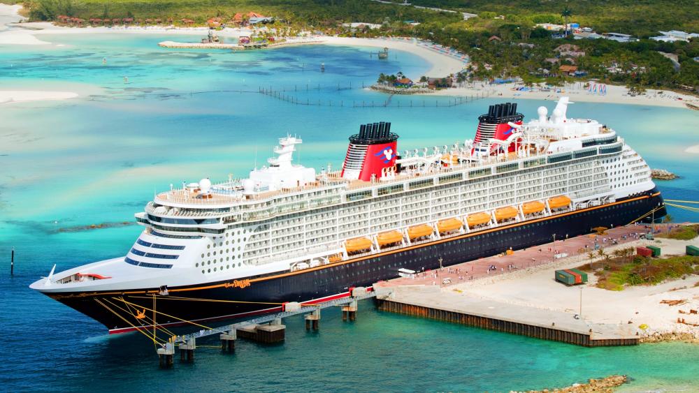 Majestic Cruise Ship in Crystal Clear Waters wallpaper