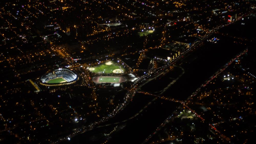 Aerial View of Yankee Stadium & the Surrounding Cityscape at Night wallpaper