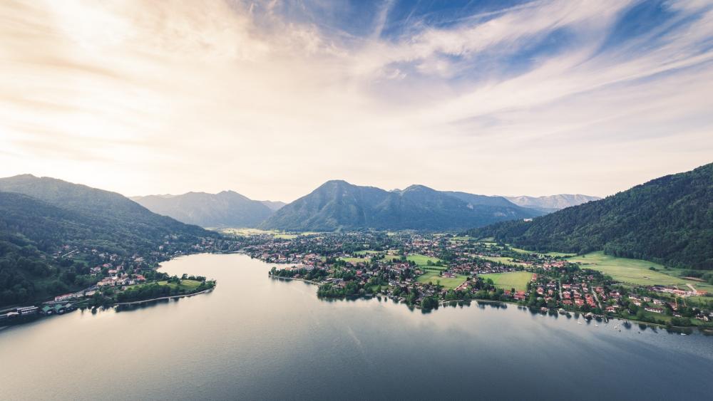 Serene Landscape Overlooking Mountains and Lake wallpaper