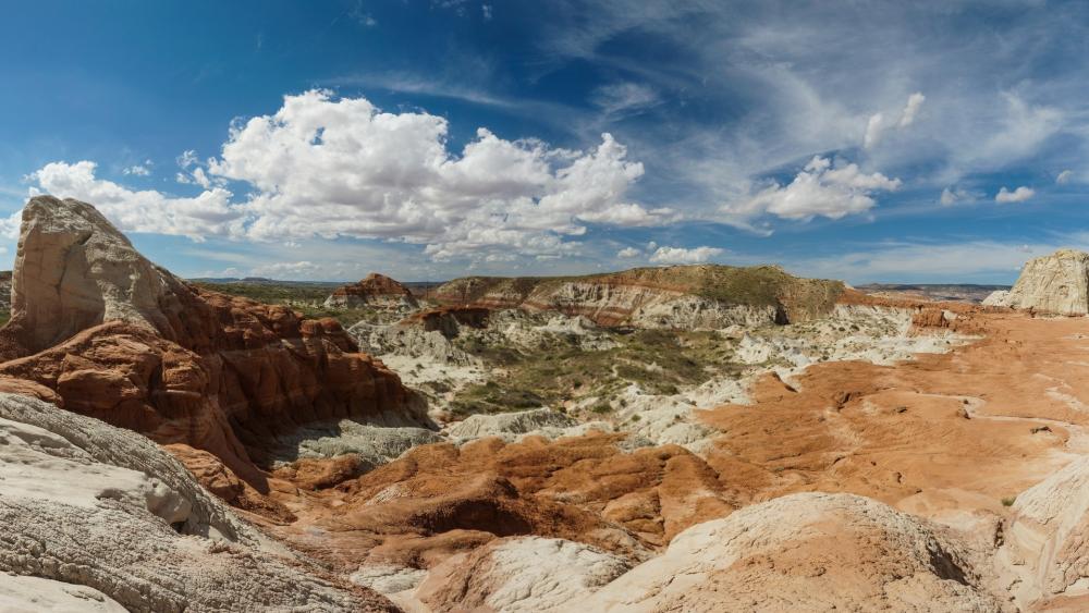 Majestic Desert Landscape Under a Bright Blue Sky wallpaper