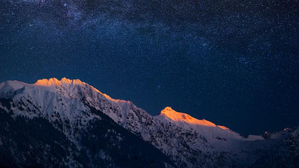 Mountain Majesty Under Starlit Skies wallpaper