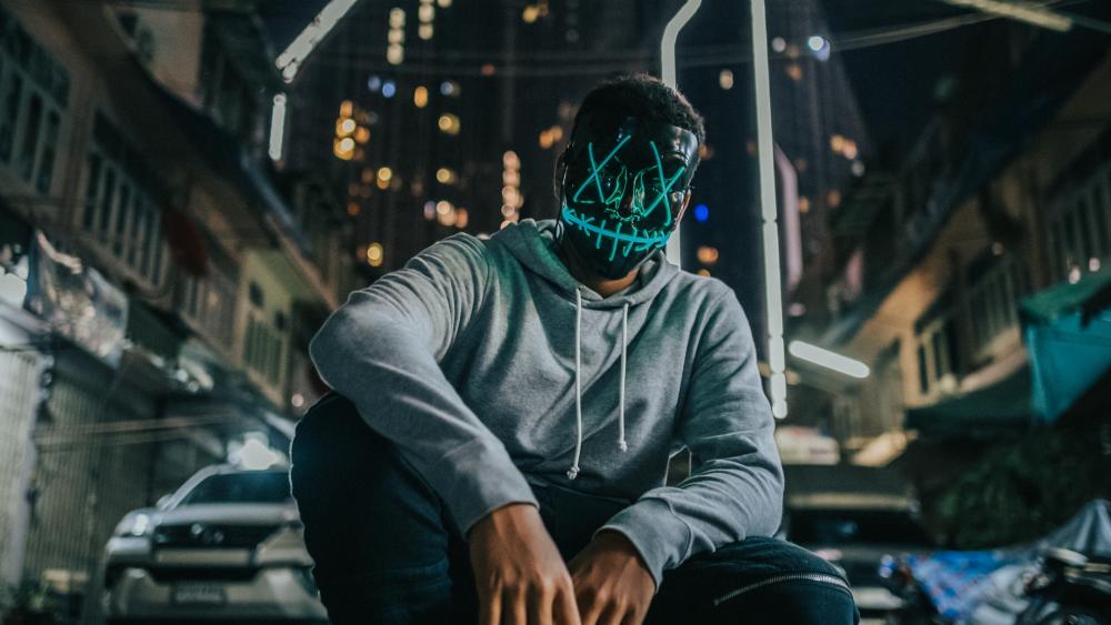 Neon Mask in the Urban Night wallpaper