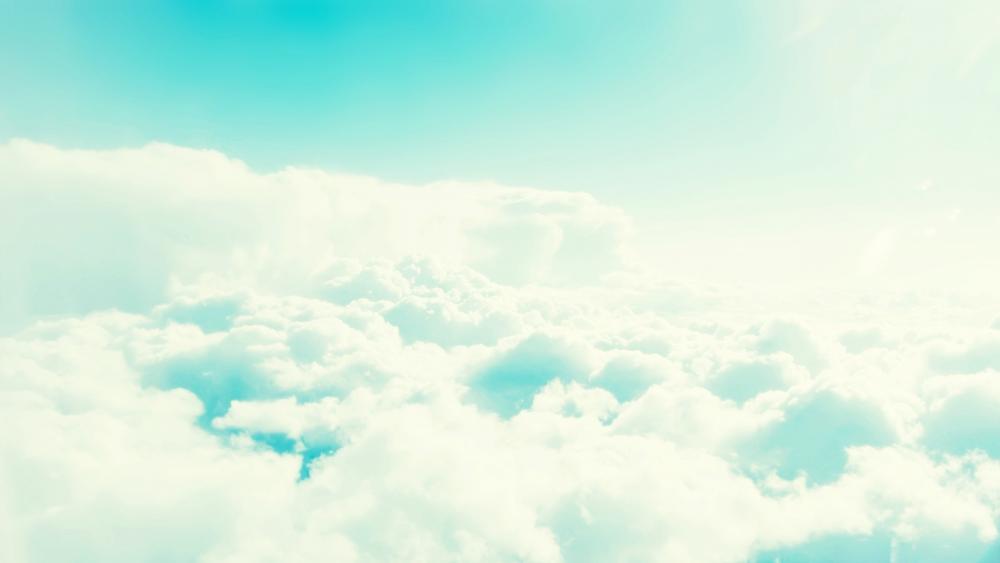 Above the fluffy clouds wallpaper